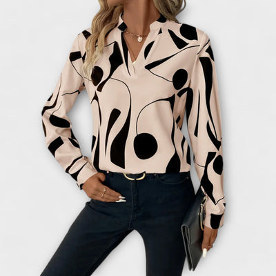 Blusa elegante de manga larga con escote en forma de V