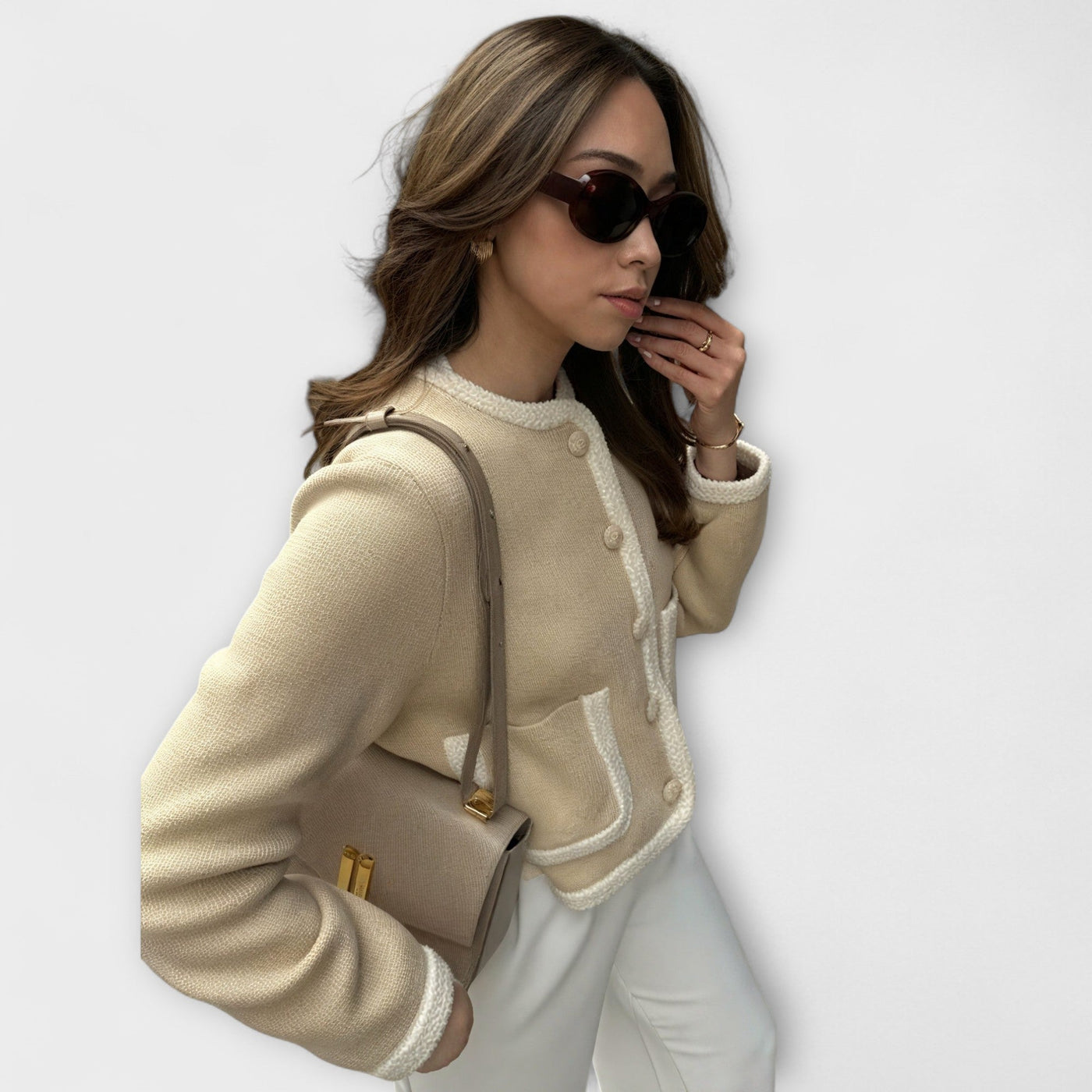 Chaqueta de punto clásica con bolsillos tipo canguro