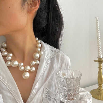 Encantado collar de perlas