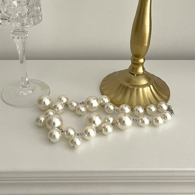 Encantado collar de perlas