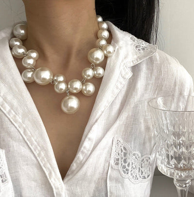 Encantado collar de perlas