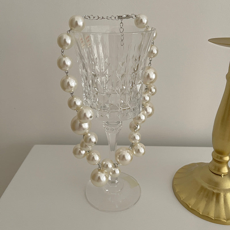 Encantado collar de perlas
