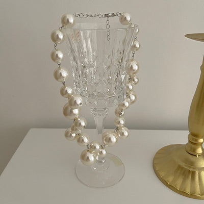 Encantado collar de perlas