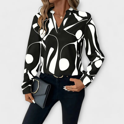 Blusa elegante de manga larga con escote en forma de V