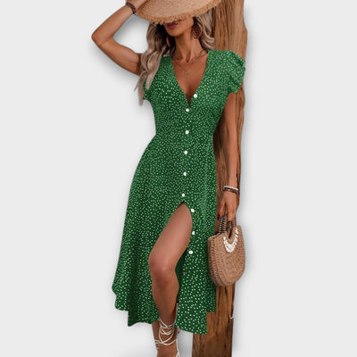 Vestido midi elegante de lunares