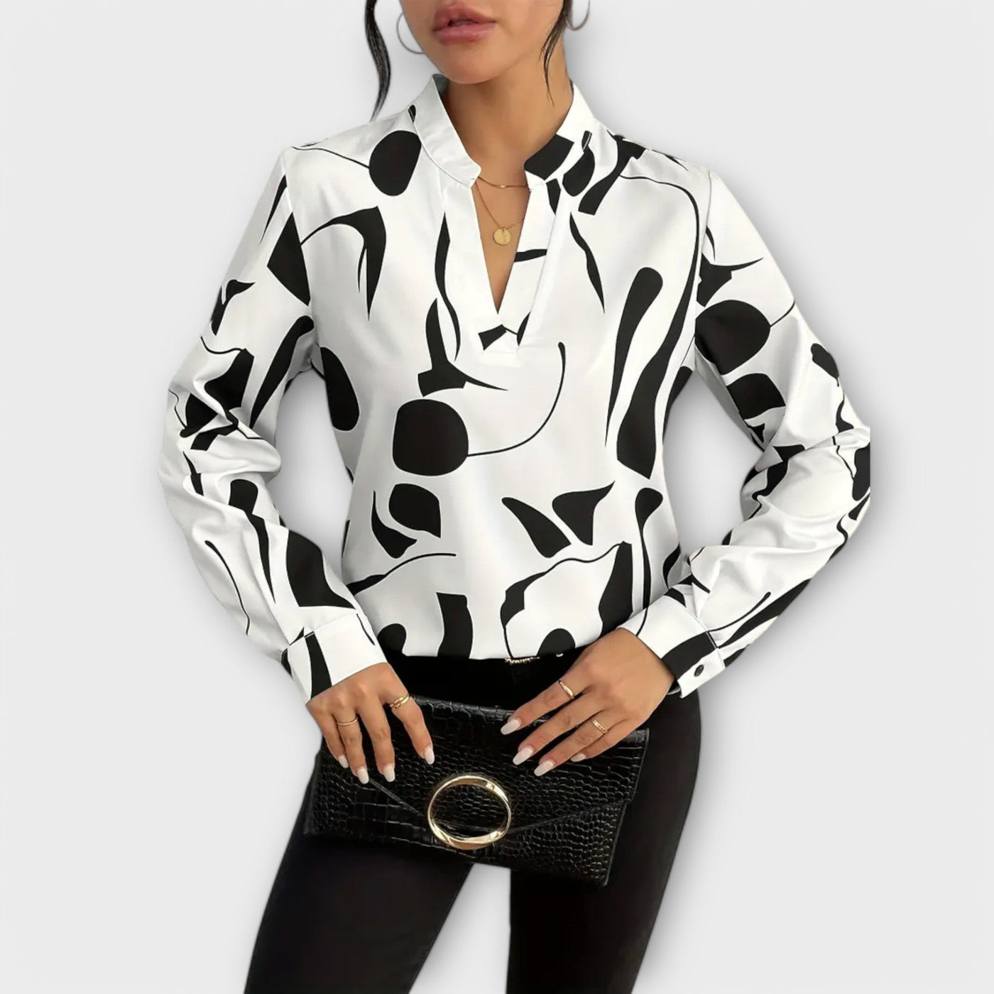 Blusa elegante de manga larga con escote en forma de V