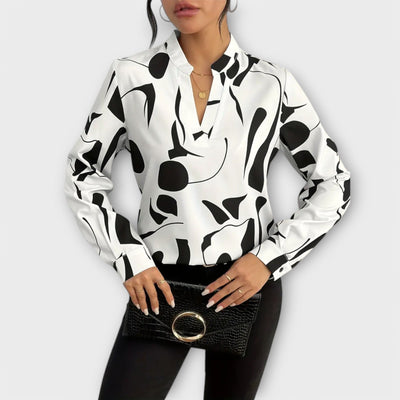 Blusa elegante de manga larga con escote en forma de V